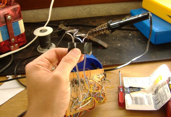 Picture of reed switches attached to wires.