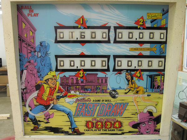 The Gottlieb Fast Draw back glass.